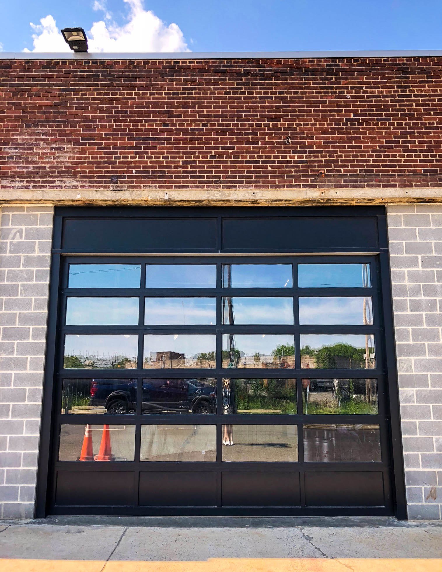 Hect Warehouse - Front window in Strip Mall